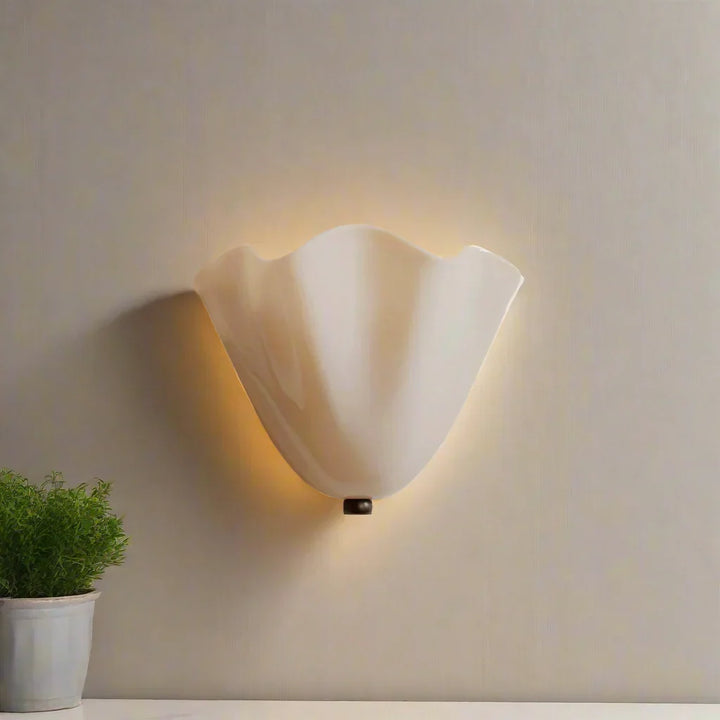 Lampada da parete LED a forma di conchiglia ispirata all&