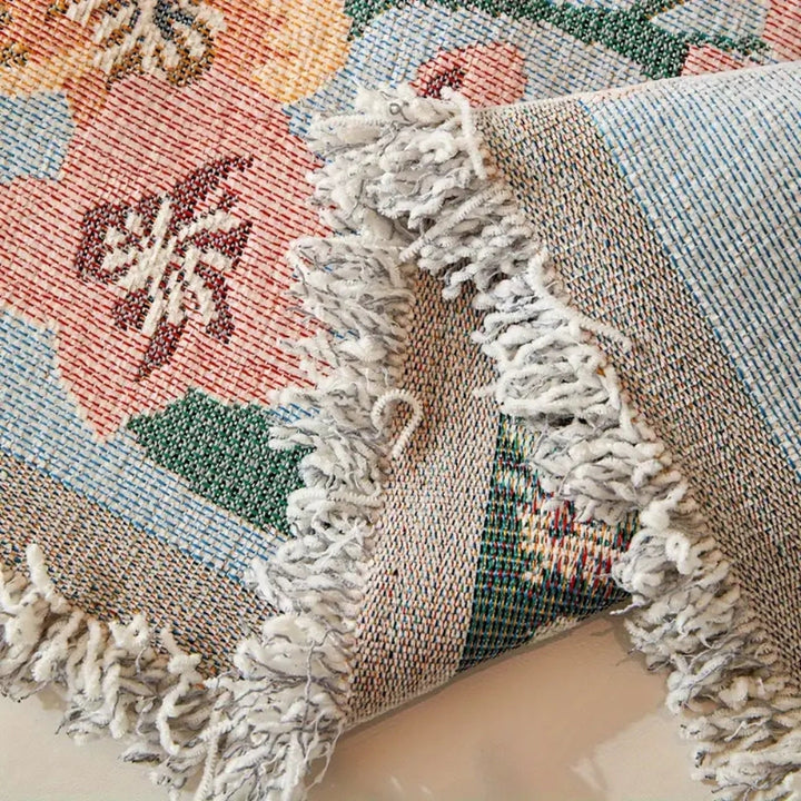 Amara: Copridivano con motivo jacquard floreale e design reversibile – per soggiorno e divano
