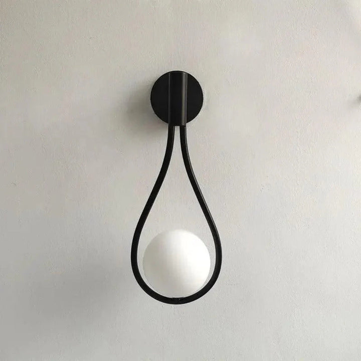 AuriLune: Applique di design con sfera di vetro – Elegante lampada da parete in stile moderno