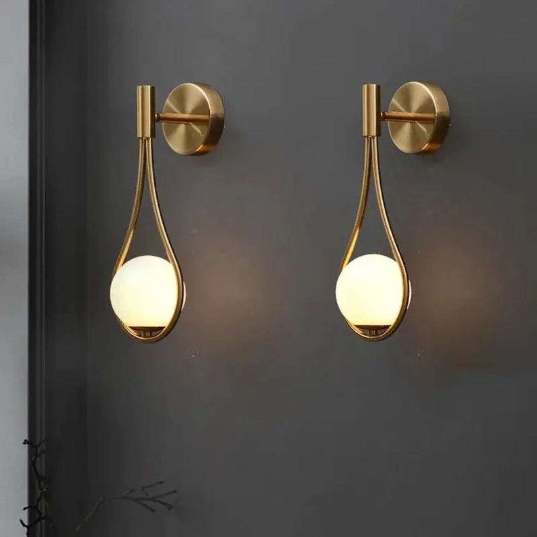 AuriLune: Applique di design con sfera di vetro – Elegante lampada da parete in stile moderno