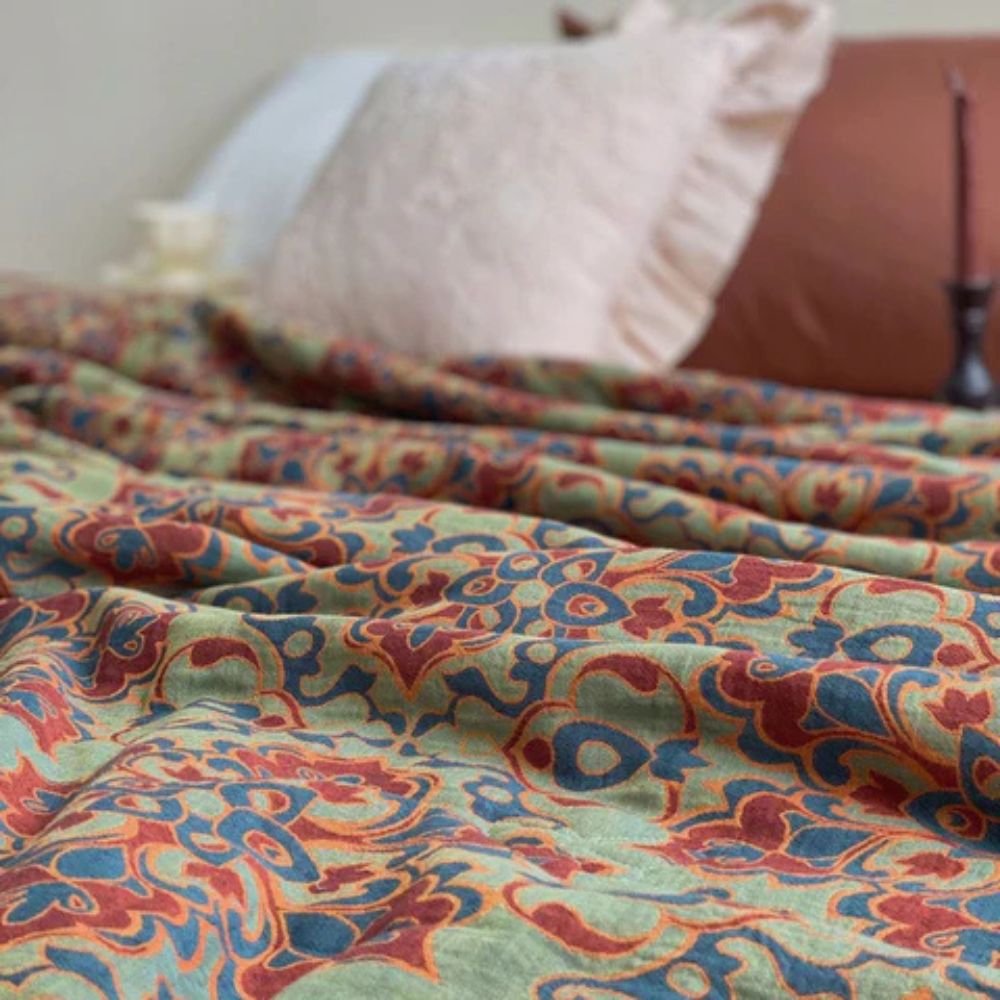 BlütenEleganz: Coperte in cotone dallo stile Boho con qualità traspirante e stampa colorata – per divano e lounge