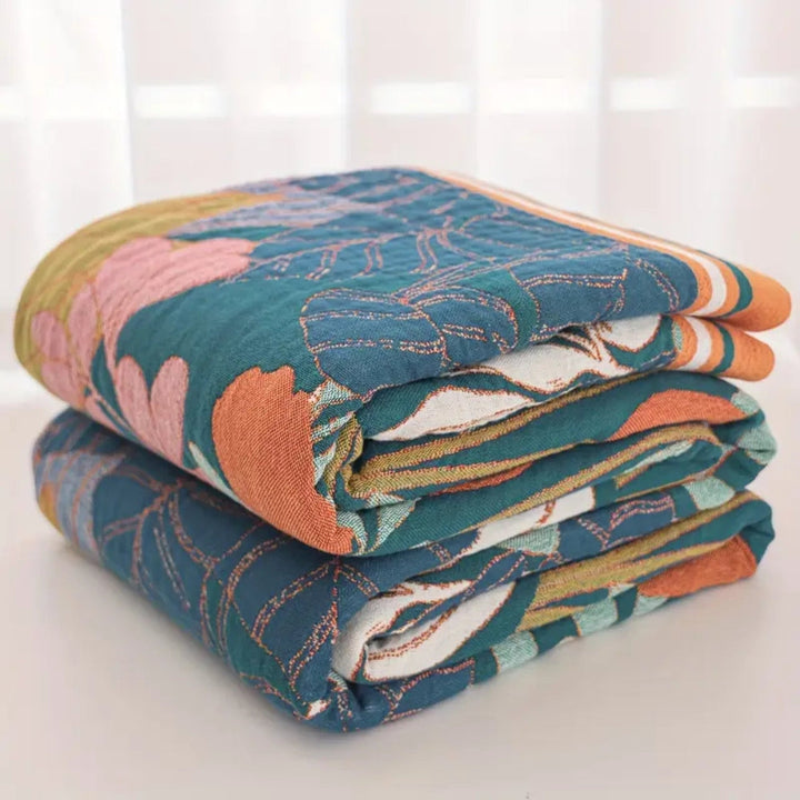 BotanischerWebstuhl: Coperta in cotone traspirante con motivo floreale botanico e leggera struttura in garza – per divano e camera da letto