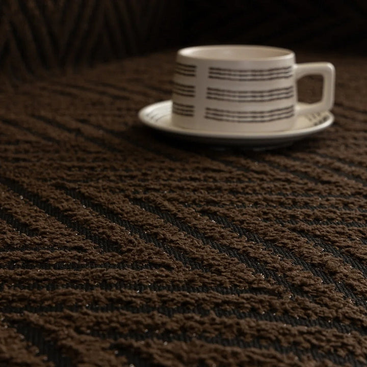 ChevronHaus: Copridivano in design a zigzag con frange decorative – per soggiorno e divano