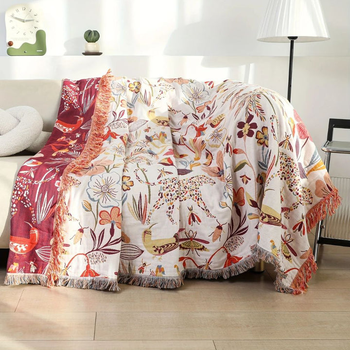 Dschungelblüte: Coperta in cotone reversibile con motivo floreale tropicale e struttura leggera – per divano e camera da letto