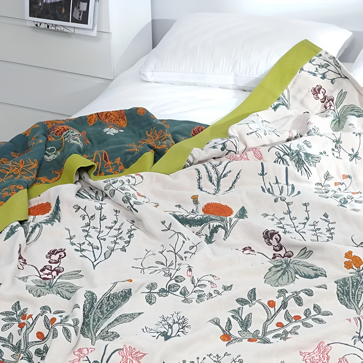 FloraHaus: Leggera coperta estiva in cotone con motivo floreale e struttura traspirante – per letto e divano