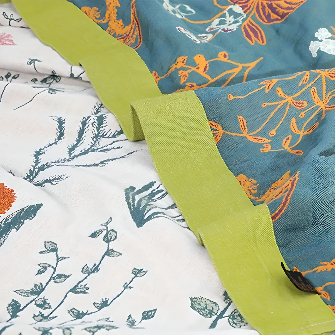 FloraHaus: Leggera coperta estiva in cotone con motivo floreale e struttura traspirante – per letto e divano