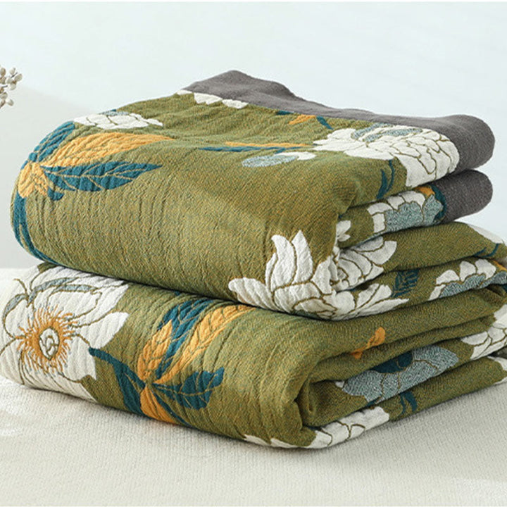 FloraWeave: Coperta rovesciabile in cotone con motivo floreale – Comfort elegante per la tua casa