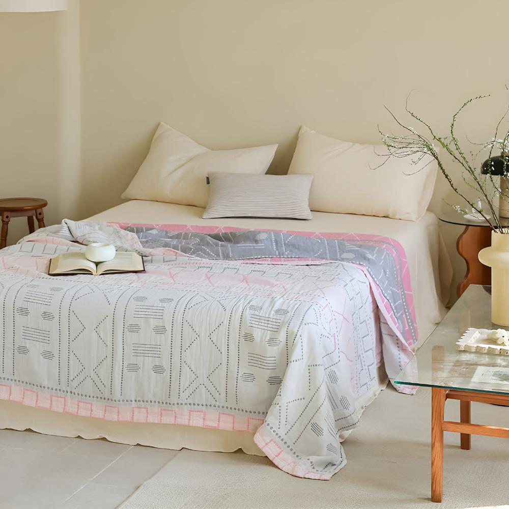 GeoSanft: Coperte in cotone biologico con moderno motivo geometrico e struttura traspirante – per divano e camera da letto