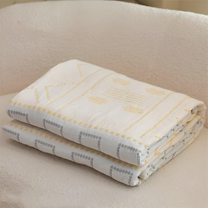 GeoSanft: Coperte in cotone biologico con moderno motivo geometrico e struttura traspirante – per divano e camera da letto