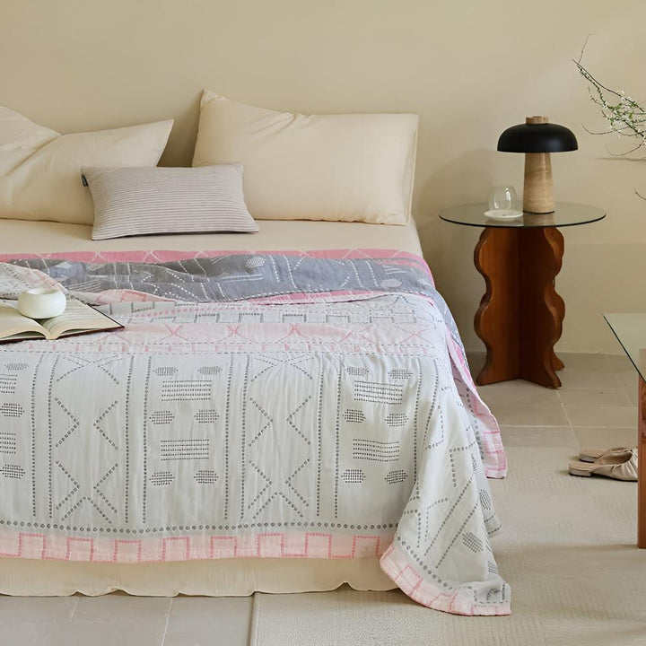 GeoSanft: Coperte in cotone biologico con moderno motivo geometrico e struttura traspirante – per divano e camera da letto