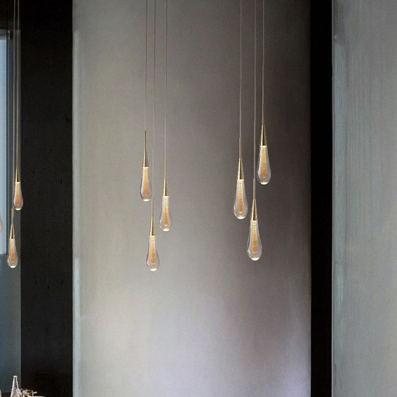 Glimma: Lampada a sospensione a forma di goccia in cristallo e metallo – Oro per camera da letto e soggiorno