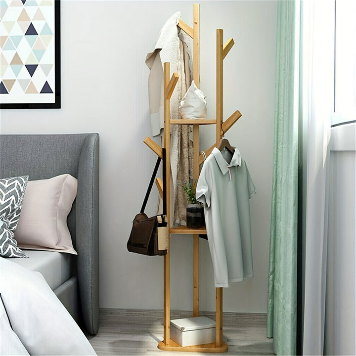 HolzGleichgewicht: Appendiabiti freestanding – elegante struttura in bambù con funzione girevole, compatta e decorativa per corridoio e soggiorno