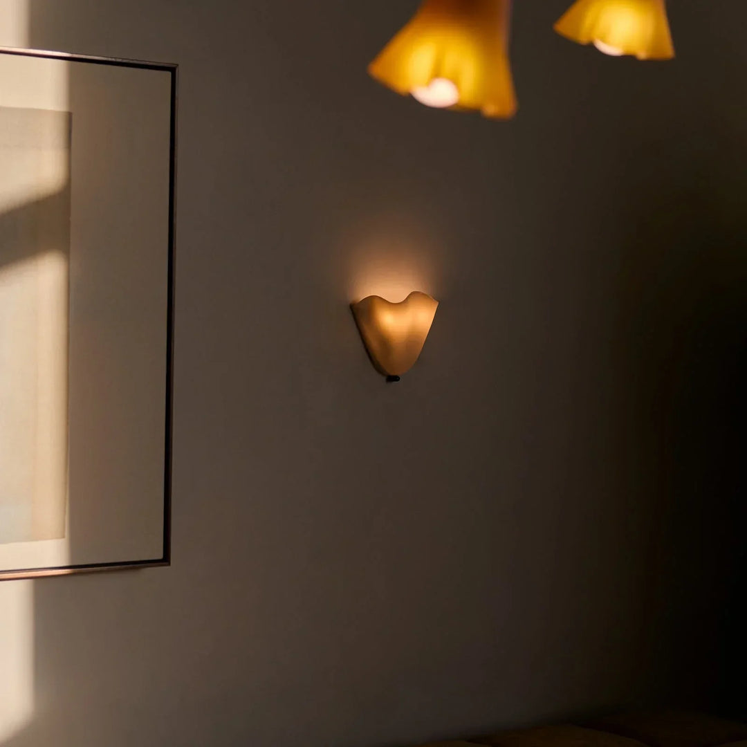 Lampada da parete LED a forma di conchiglia ispirata all&
