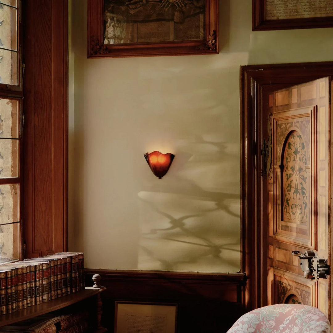 Lampada da parete LED a forma di conchiglia ispirata all&