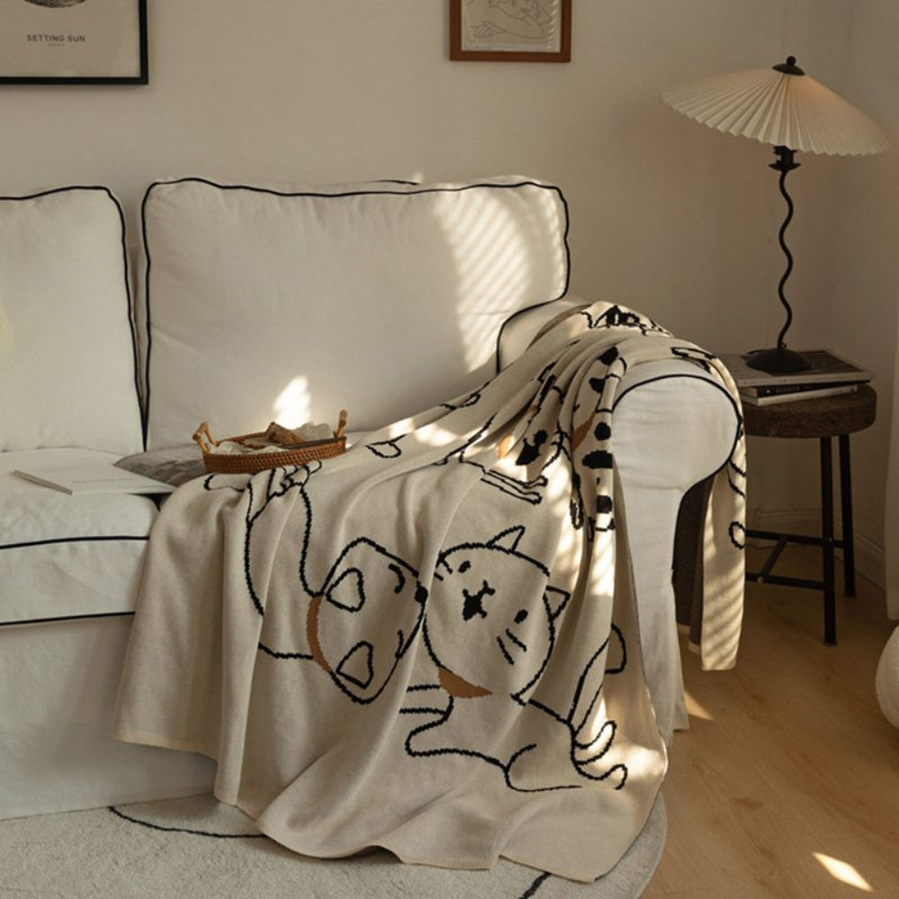 KuschelMiau: Coperte in cotone con una consistenza morbida e un design giocoso di gatti – per letto e soggiorno