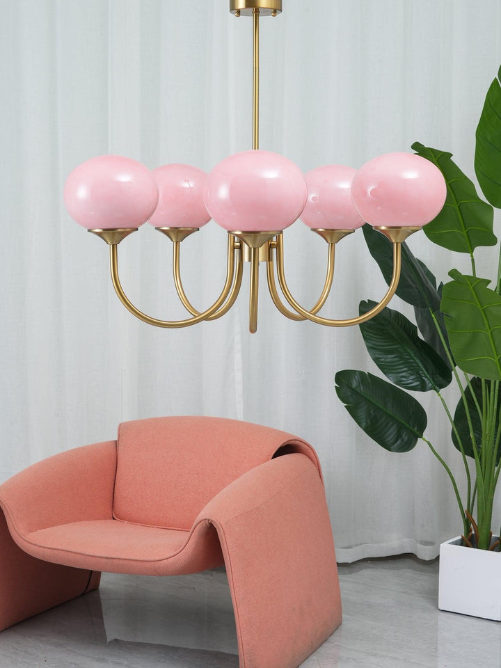 LumiRosé: Lampadario Designer con finitura dorata e paralumi in vetro