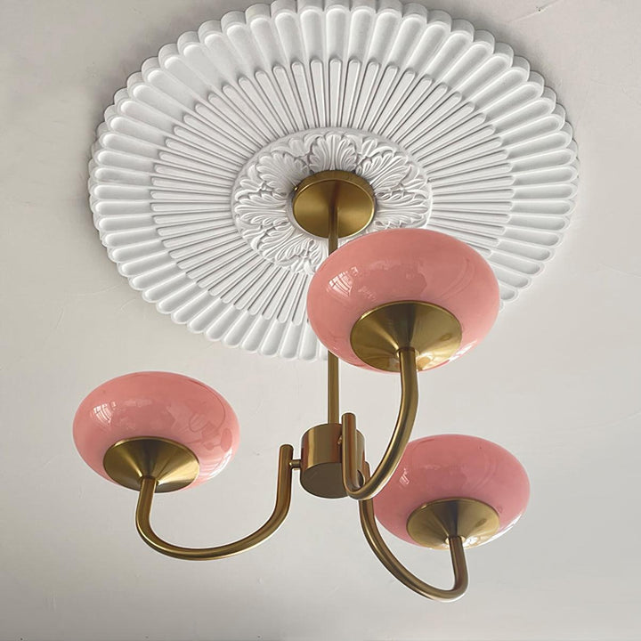 LumiRosé: Lampadario Designer con finitura dorata e paralumi in vetro
