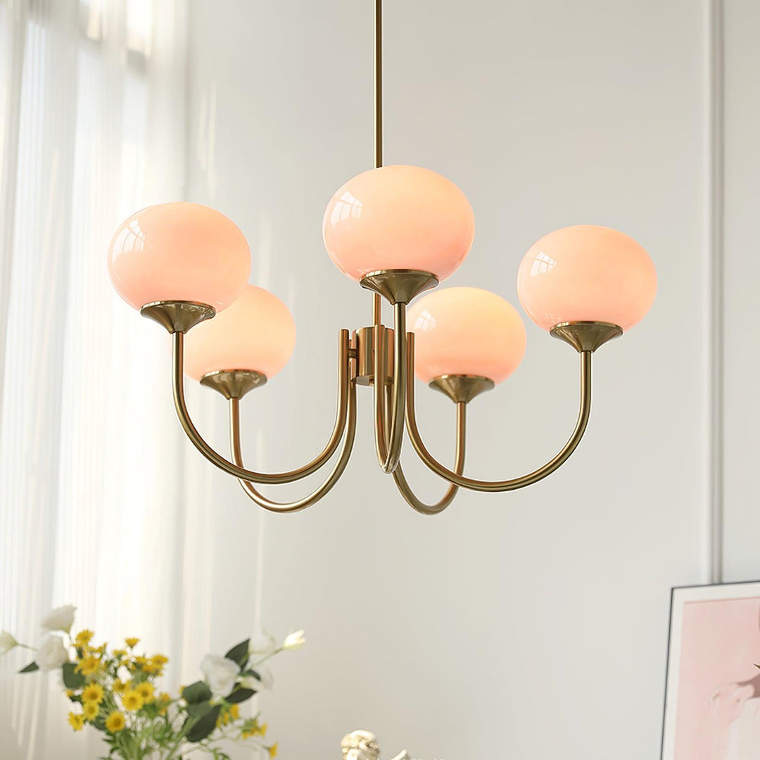 LumiRosé: Lampadario Designer con finitura dorata e paralumi in vetro