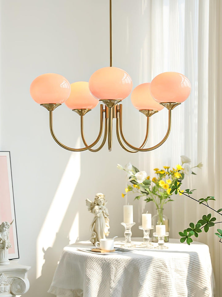 LumiRosé: Lampadario Designer con finitura dorata e paralumi in vetro