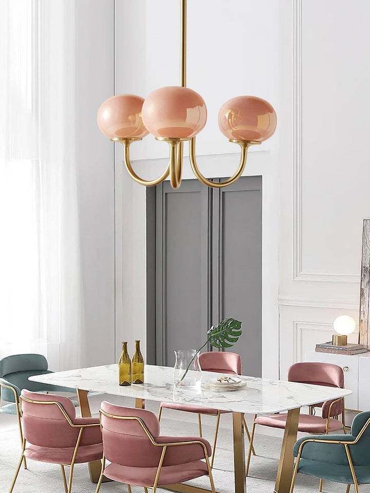 LumiRosé: Lampadario Designer con finitura dorata e paralumi in vetro