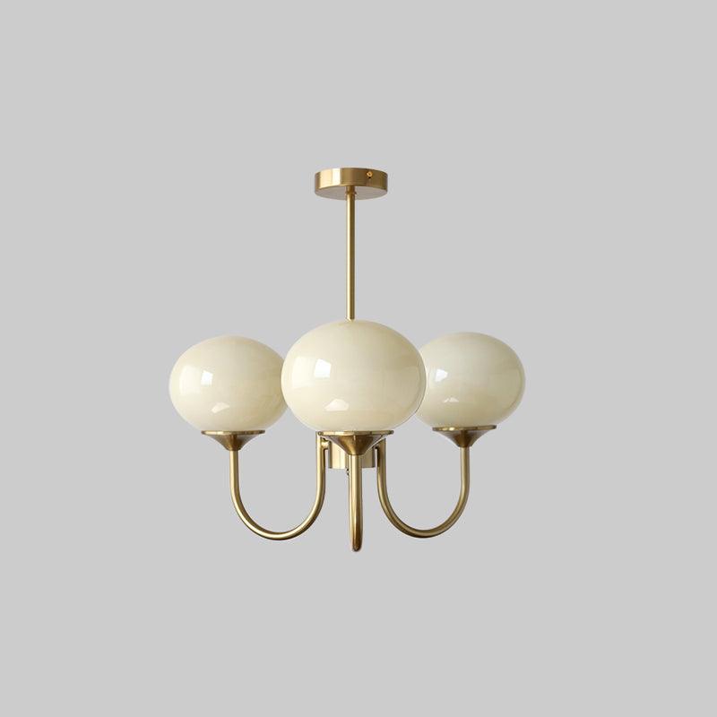 LumiRosé: Lampadario Designer con finitura dorata e paralumi in vetro
