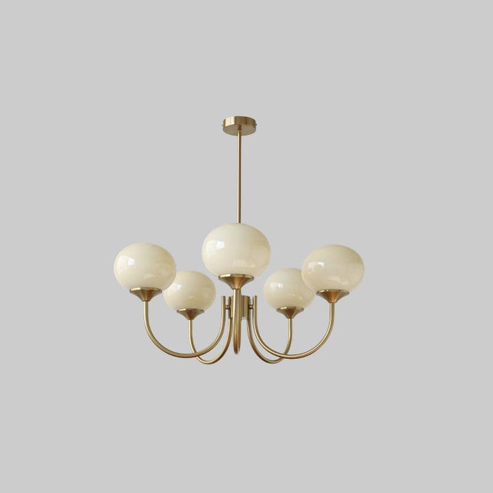 LumiRosé: Lampadario Designer con finitura dorata e paralumi in vetro