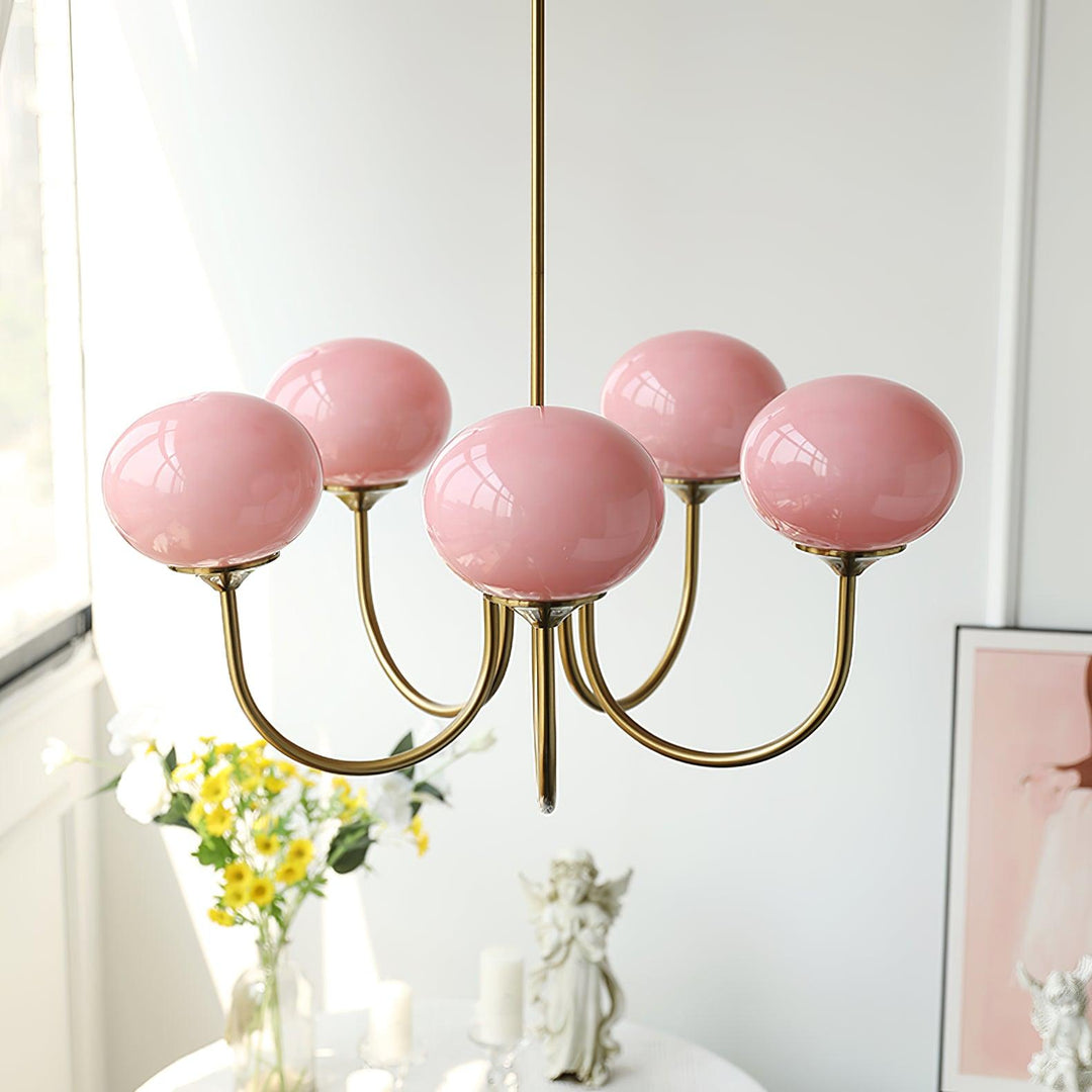 LumiRosé: Lampadario Designer con finitura dorata e paralumi in vetro