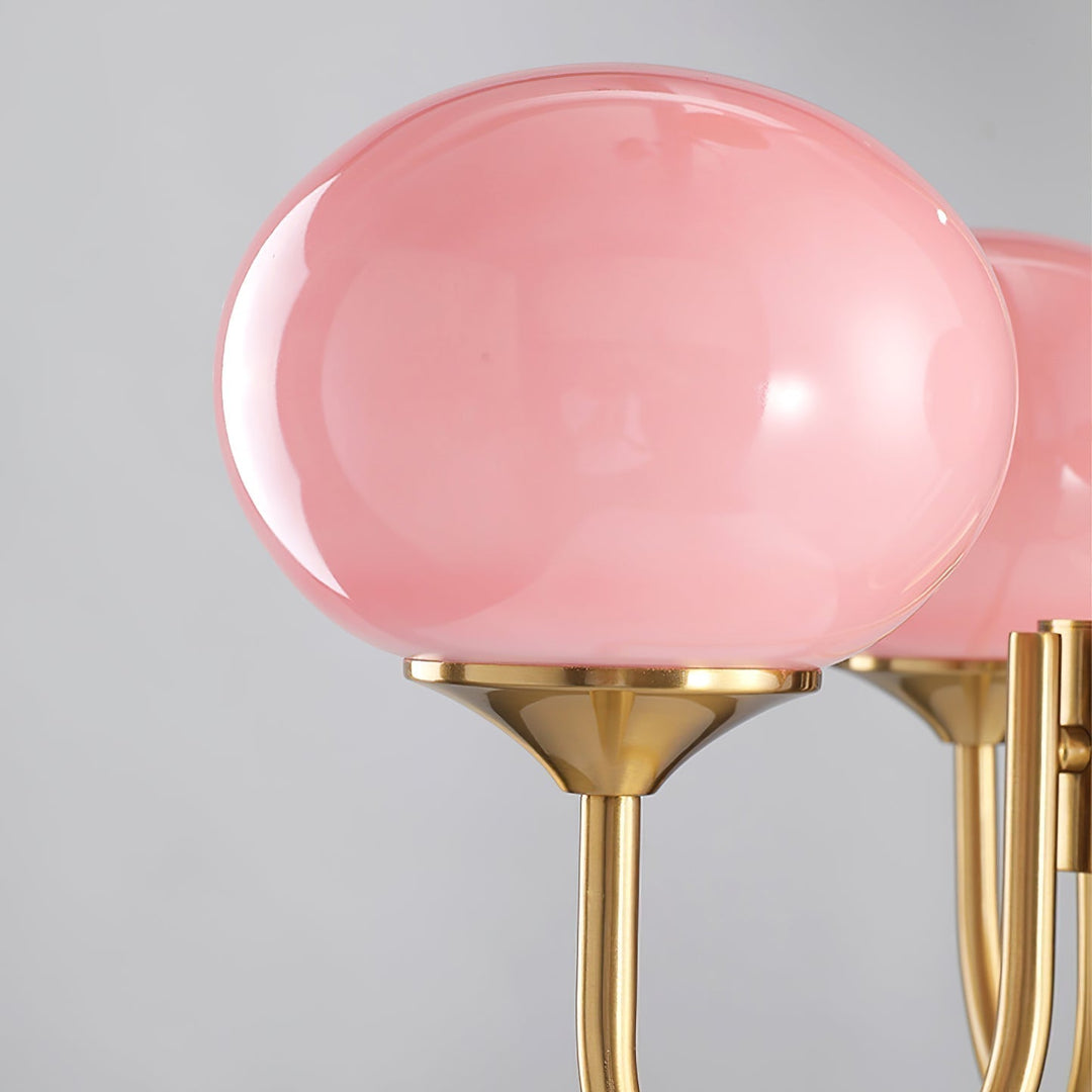 LumiRosé: Lampadario Designer con finitura dorata e paralumi in vetro