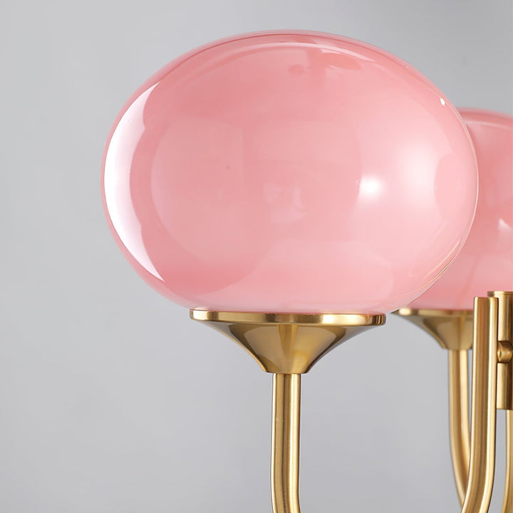 LumiRosé: Lampadario Designer con finitura dorata e paralumi in vetro
