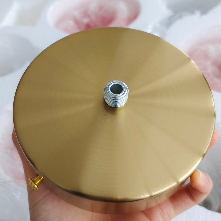 LumiRosé: Lampadario Designer con finitura dorata e paralumi in vetro