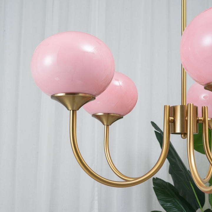 LumiRosé: Lampadario Designer con finitura dorata e paralumi in vetro