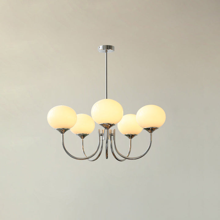 LumiRosé: Lampadario Designer con finitura dorata e paralumi in vetro