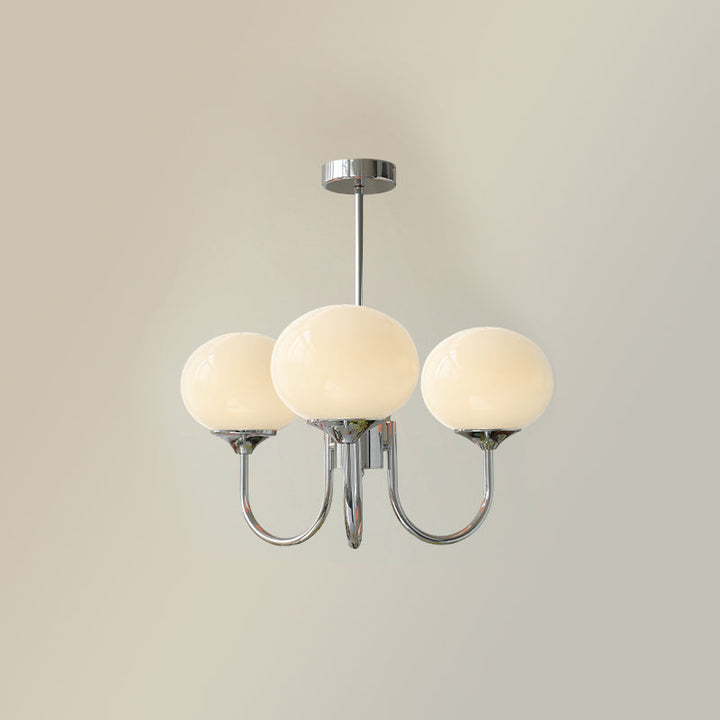 LumiRosé: Lampadario Designer con finitura dorata e paralumi in vetro