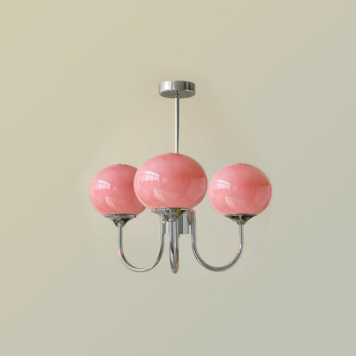 LumiRosé: Lampadario di design con finitura dorata e paralumi in vetro