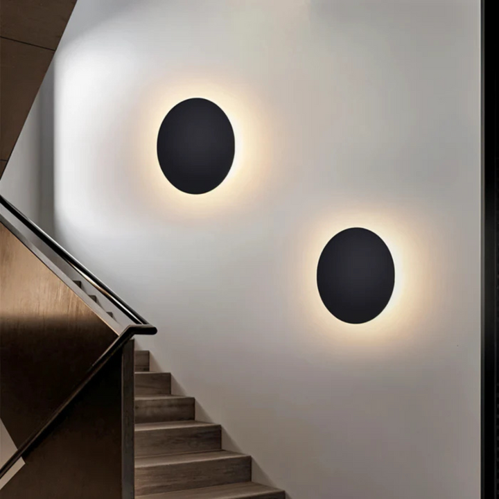 LumoLite: Applique LED rotonda in ferro con luce bianca calda e design moderno – per soggiorno e camera da letto