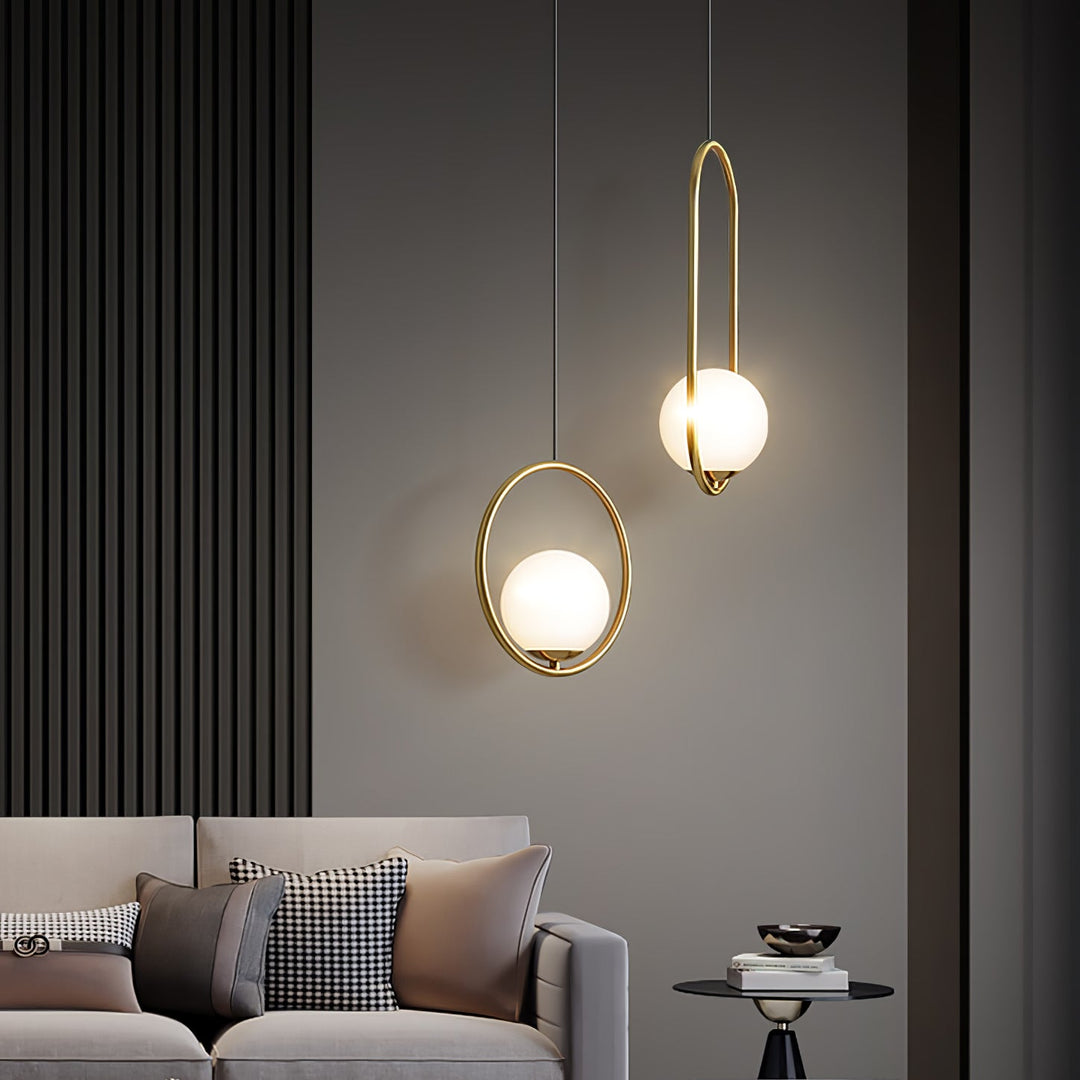 Milora: Lampada a sospensione in vetro e metallo con silhouette slanciata – per interni moderni