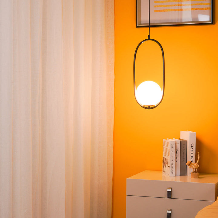 Milora: Lampada a sospensione in vetro e metallo con silhouette slanciata – per interni moderni
