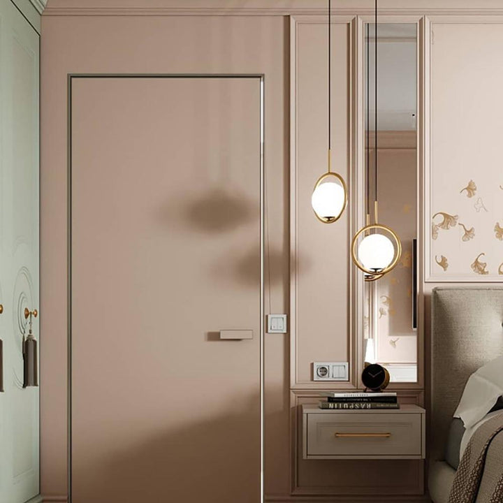 Milora: Lampada a sospensione in vetro e metallo con silhouette slanciata – per interni moderni