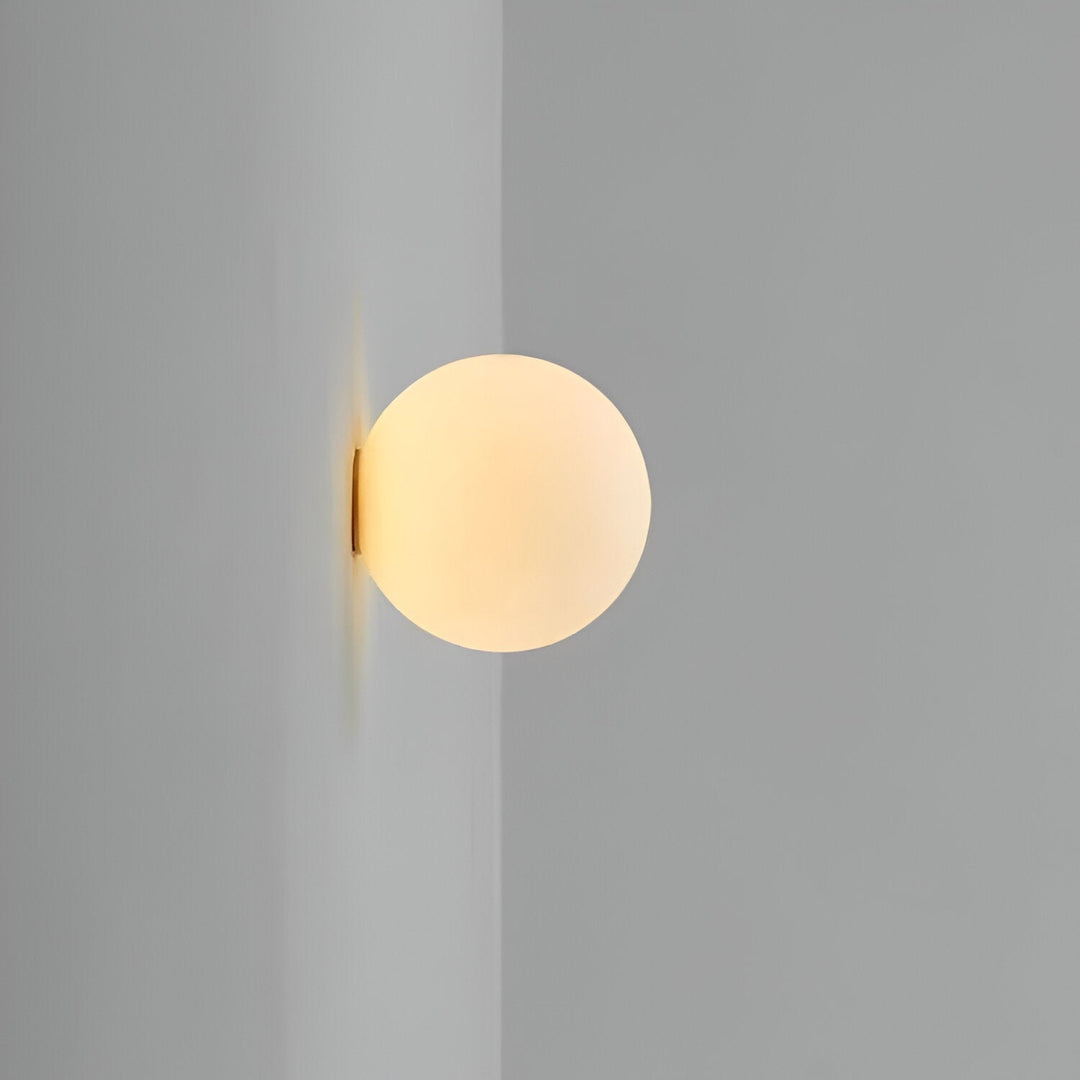 Orbique: Applique a Sfera Moderna – Lampada in Vetro Rotondo dal Design Minimalista