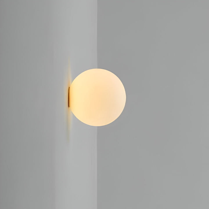 Orbique: Applique a Sfera Moderna – Lampada in Vetro Rotondo dal Design Minimalista