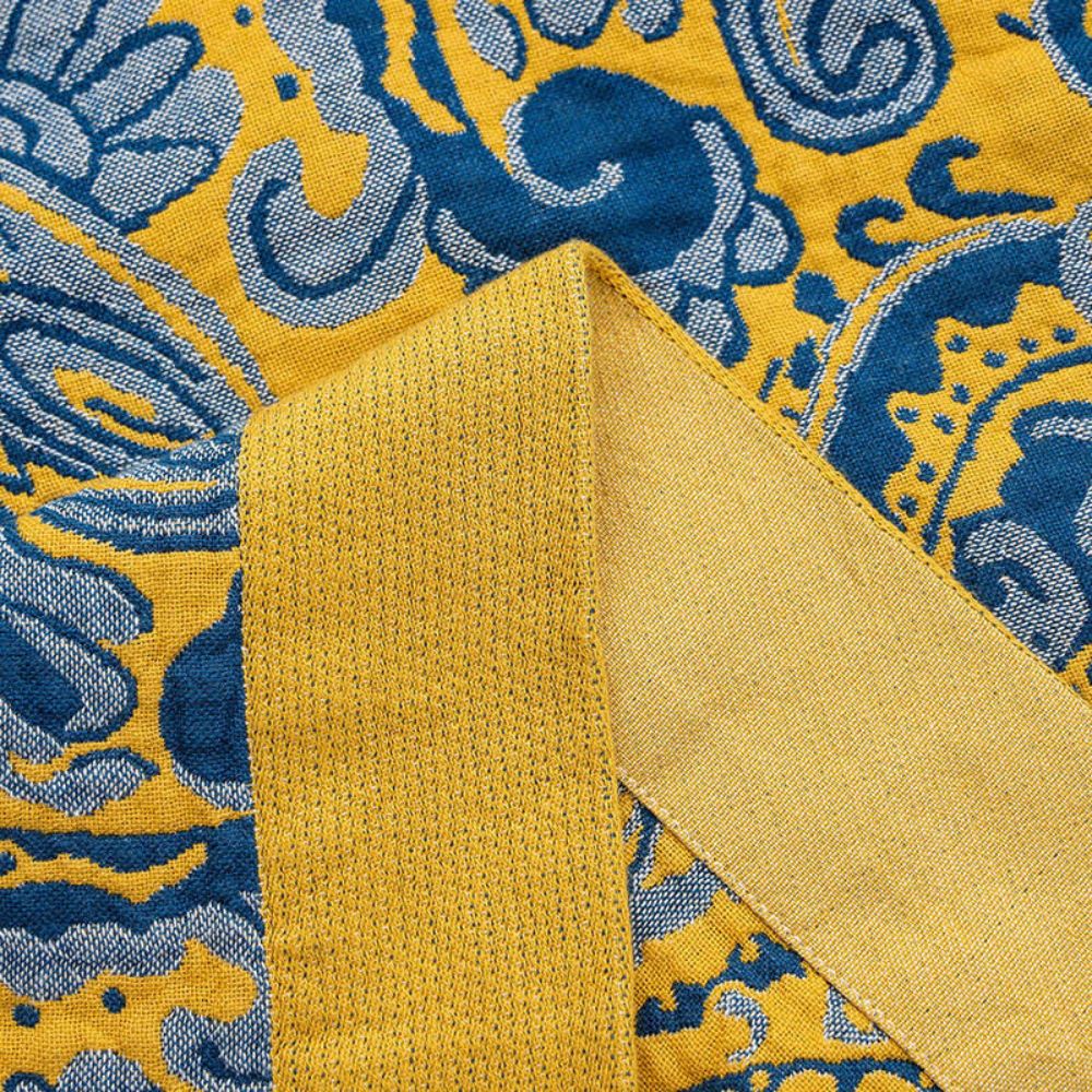 RetroSoleil: Coperte in cotone con classico motivo retrò e leggerezza traspirante – per divano e area living