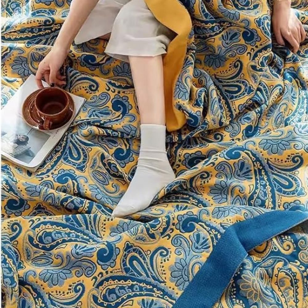 RetroSoleil: Coperte in cotone con classico motivo retrò e leggerezza traspirante – per divano e area living