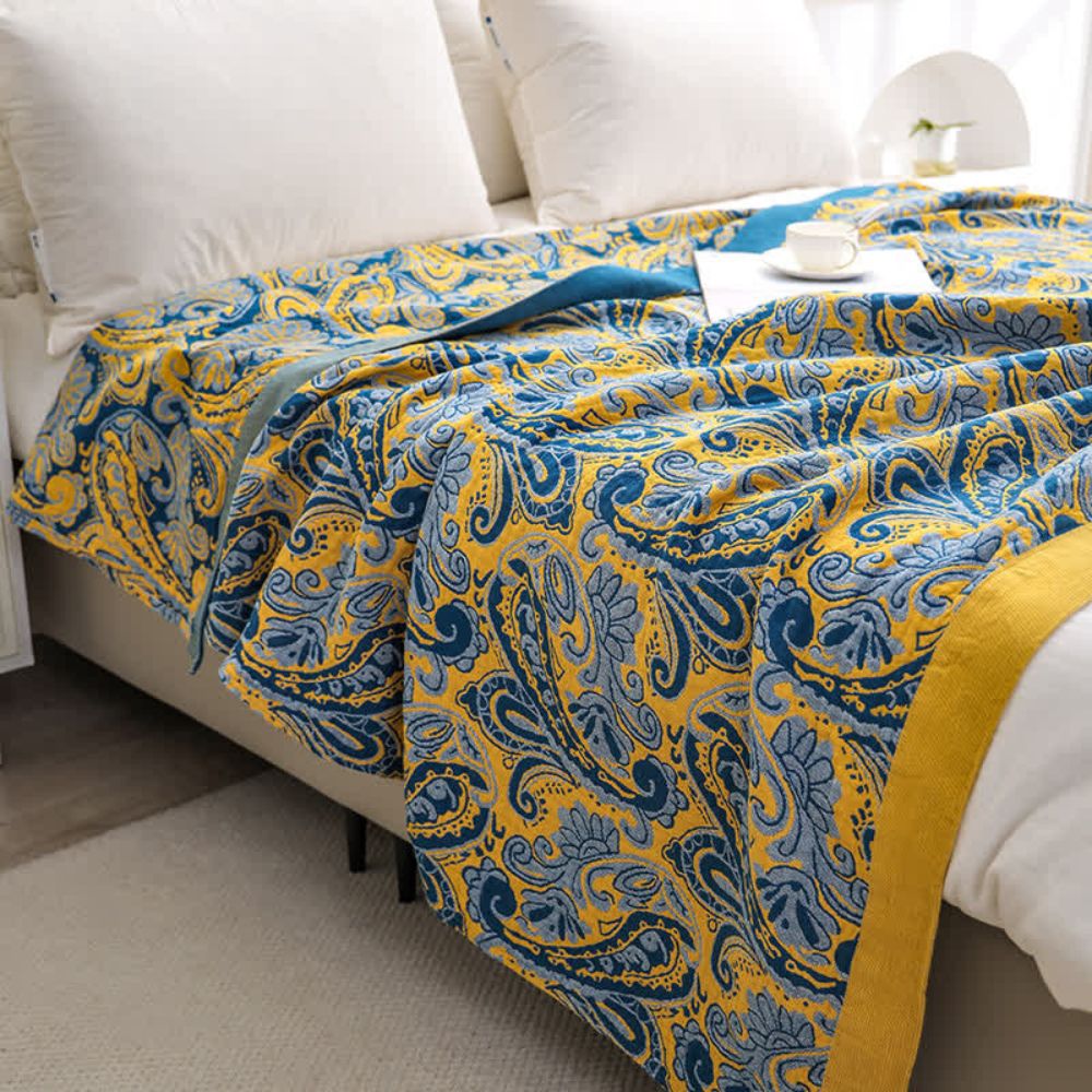 RetroSoleil: Coperte in cotone con classico motivo retrò e leggerezza traspirante – per divano e area living