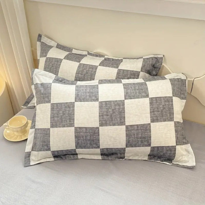 SchlossTraum: Set di copripiumino a quadri – moderno, traspirante e decorativo con motivo Nero-Crema per la camera da letto