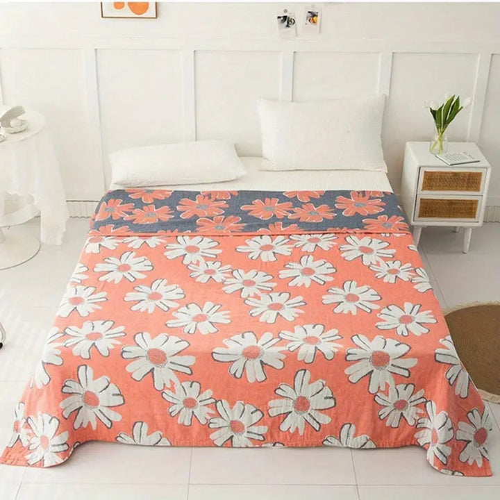 SommerWiese: Morbida coperta in cotone con stampa di margherite e garza a 4 strati – per divano e letto