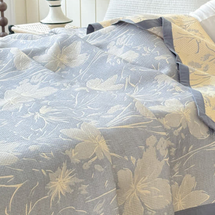 Velurelle: Coperte in cotone con delicato motivo floreale e leggerezza a tre strati – per divano e area living
