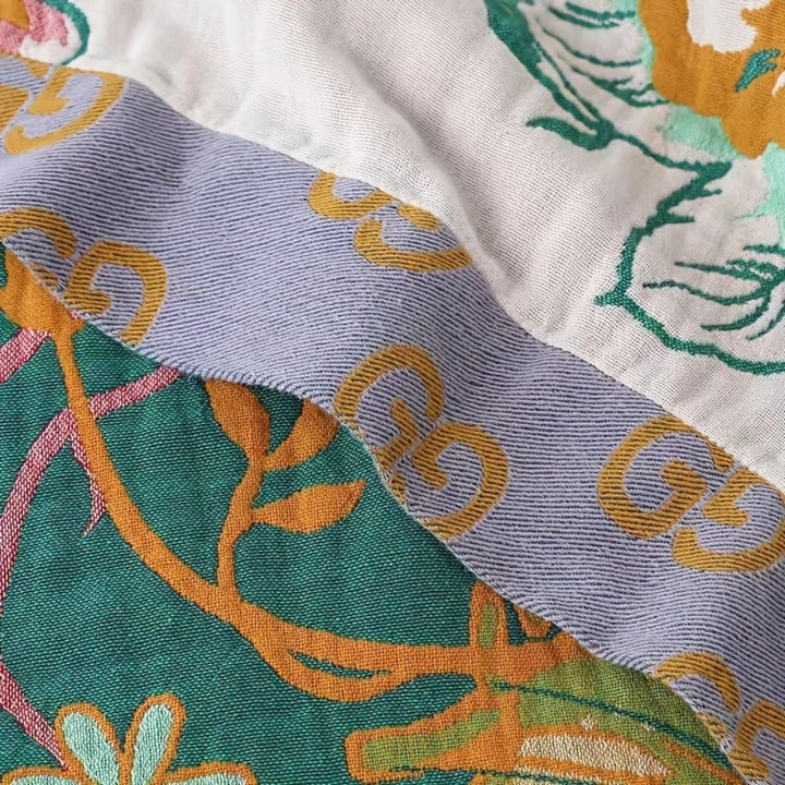 WildeBlüte: Coperta decorativa in cotone con motivo di fiori e farfalle – per camera da letto e soggiorno