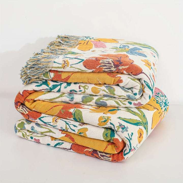 WildeBlüte: Leggera coperta estiva in cotone con motivo floreale da giardino e struttura traspirante – per letto e divano