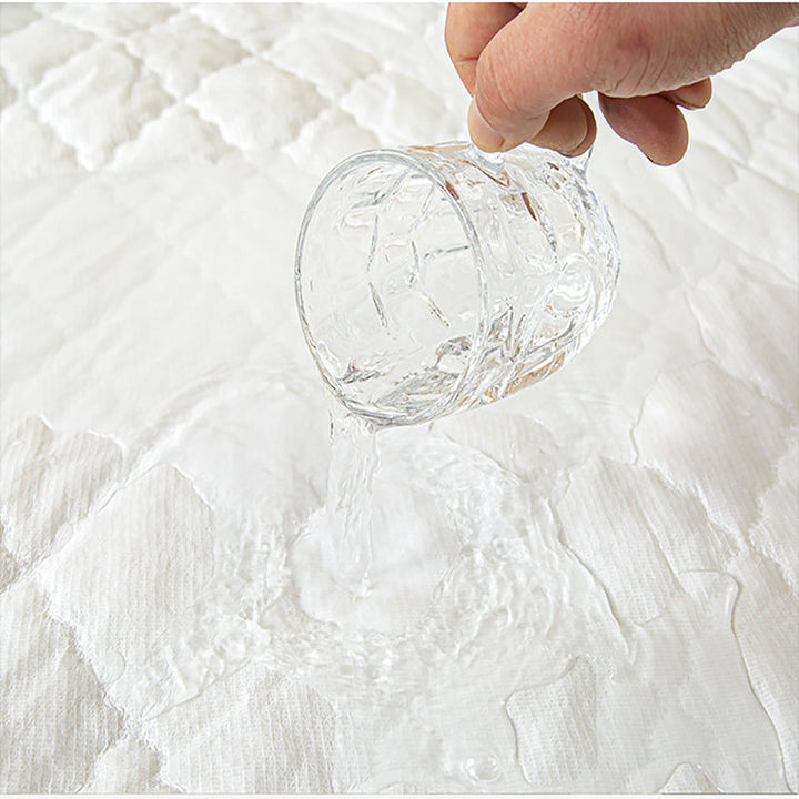 SleepTide™ – Coprimaterasso Imbottito Impermeabile 360°